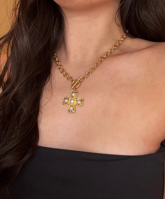 Palazzo cross statement necklace